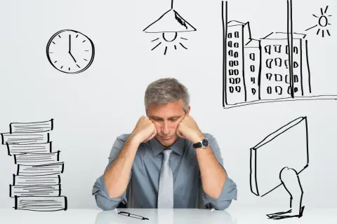 Un homme épuisé, accablé par le stress du travail, semble souffrir d'insomnie. Des dessins symbolisent le temps qui passe, la fatigue et la pression.
