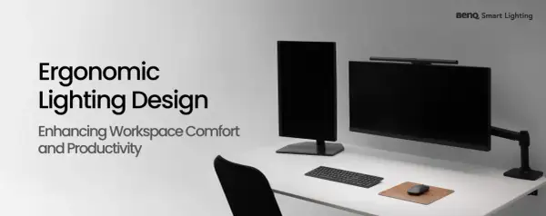 Bureau moderne avec deux écrans, clavier, souris et barre lumineuse. Le texte "Ergonomic Lighting Design" suggère une optimisation de la **norme éclairage lux** pour le confort.