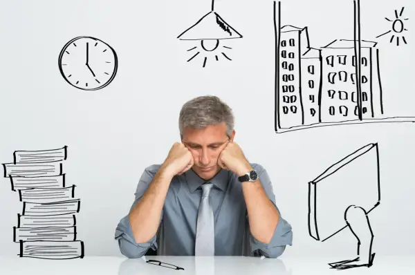 Un homme épuisé, accablé par le stress du travail, semble souffrir d'insomnie. Des dessins symbolisent le temps qui passe, la fatigue et la pression.